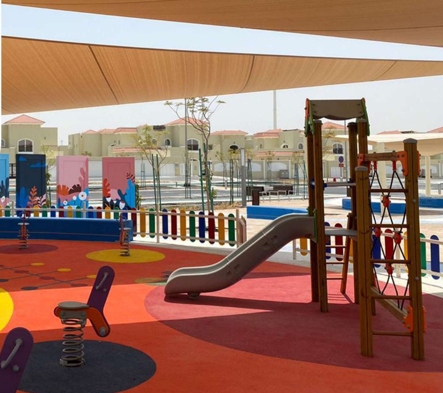 Playground Equipment · Rubber Flooring · Wood Fence · Running Track